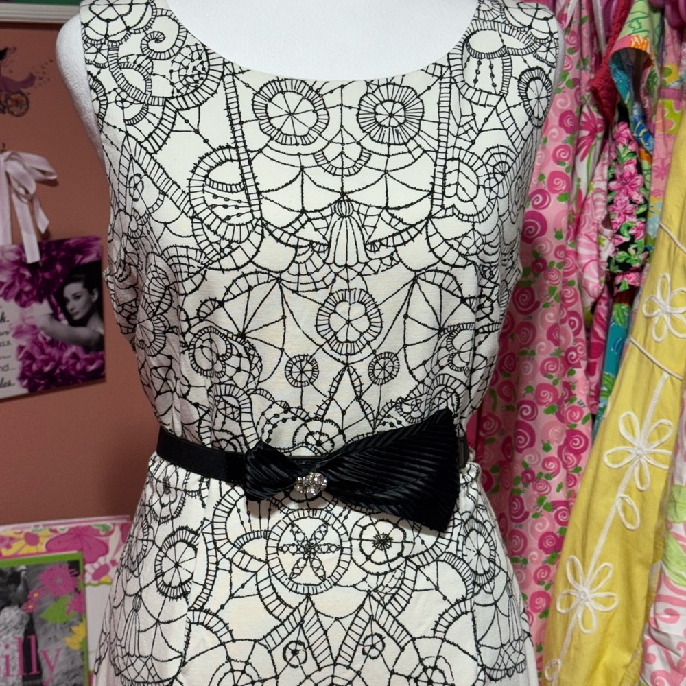Lilly Pulitzer cream color dress with elegant lace design and black snap belt. - Picture 2 of 5